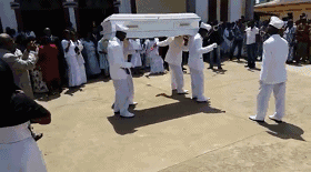 白衣服黑人抬棺动态图